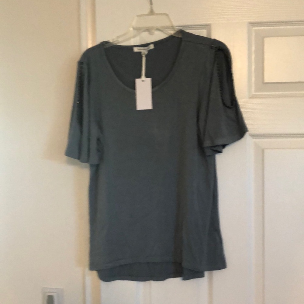 Cold shoulder top with studded arms